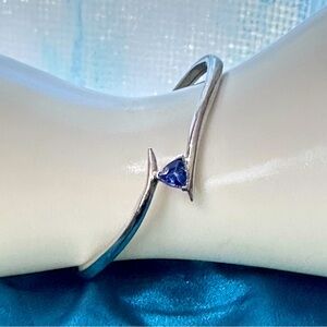 Sleek Silver Bracelet with Blue Accent